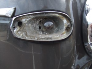 Corroded Rover sidelight Mazak metal crumbles away quickly